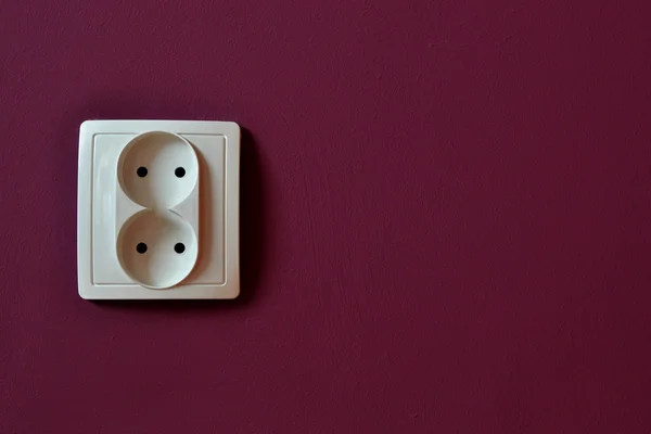 Alone outlet on wall background — Stock Photo, Image