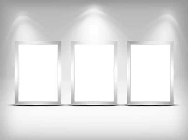 Three empty frames on a wall — Stock Photo, Image