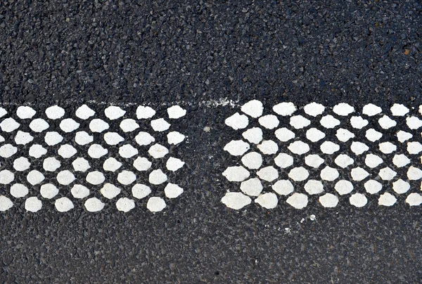 New asphalt texture with white dots line — Stock Photo, Image