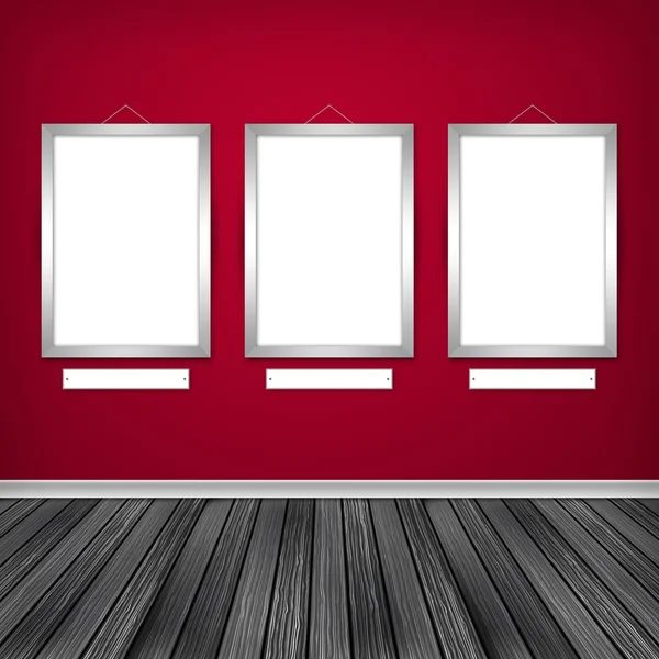Three empty frames on a wall — Stock Photo, Image