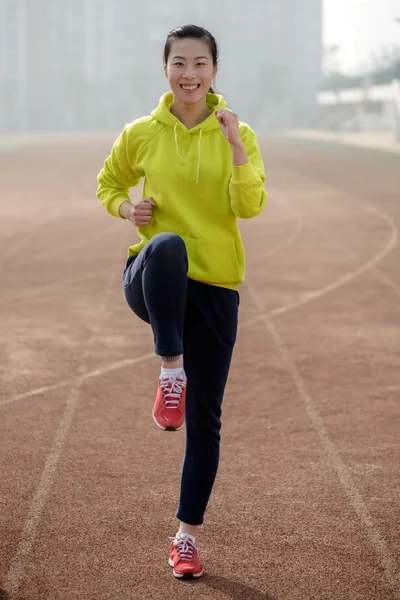Sport fitness vrouw, atletische meisje uitoefening Rechtenvrije Stockafbeeldingen