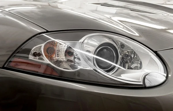 Closeup headlights of car. — Stock Photo, Image