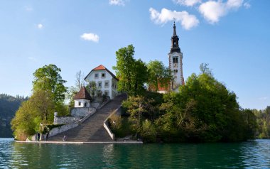 a beautiful view of the sunset in the bled lake and the Bled Island, Slovenia