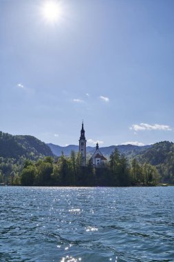 a beautiful view of the sunset in the bled lake and the Bled Island, Slovenia