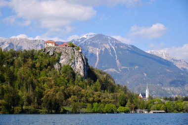 a beautiful view of the sunset in the bled lake and the Bled Island, Slovenia