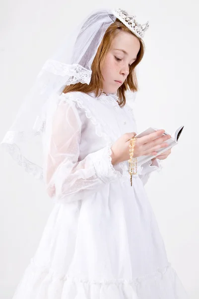 Young girl in her First Communion dress — Stock Photo, Image