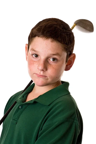Ung pojke håller en golfklubba — Stockfoto