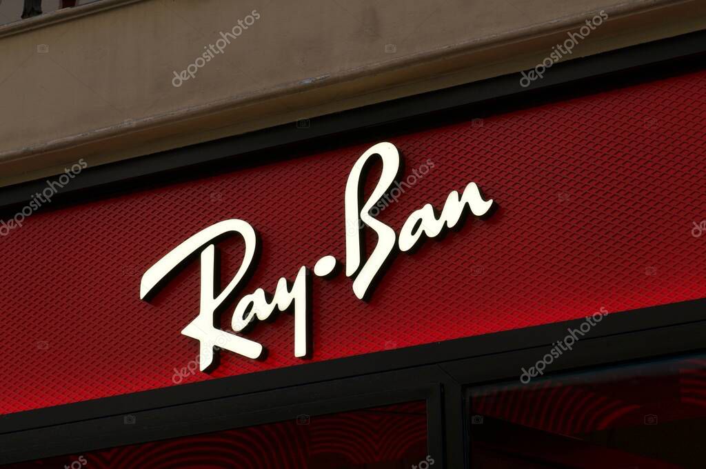 Firenze, Tuscany, Italy - 28th September 2021 : Ray-Ban store sign hanging in Florence, Italy. Ray-Ban is an American-Italian brand of luxury sunglasses and eyeglasses created in 1936