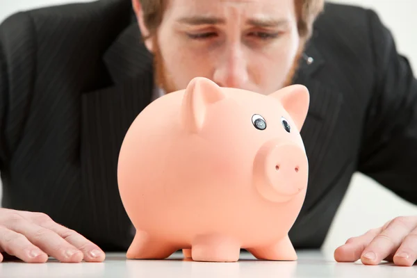 Cruel world, piggybank have to be sacrificed — Stock Photo, Image