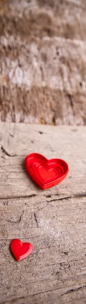 Love of red hearts on wooden background — Stock Photo, Image