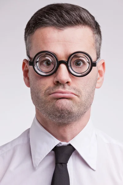 Upset and disappointed nerd clerk — Stock Photo, Image
