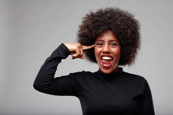 Mischievous Trendy Young Black Woman Pointing Her Temple Mischievous Grin — Stock Photo, Image