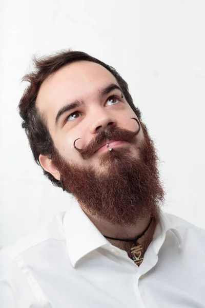 Hipster Hombre Una Actitud Pensativa Con Una Barba Gruesa Vistoso —  Fotos de Stock