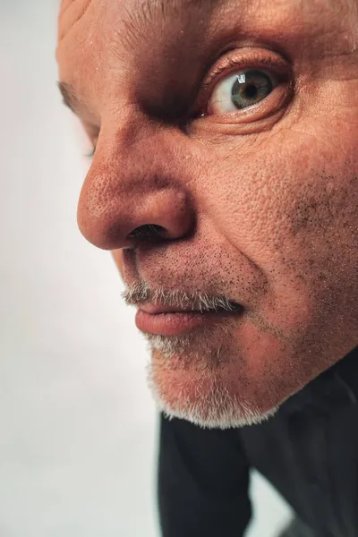 Quirky Portrait Senior Man Peering Camera One Eye Close Lens — Stock Photo, Image