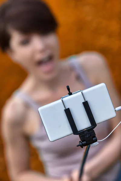 Young Woman Using Selfie Stick Take Self Portrait Her Mobile — Stock Photo, Image