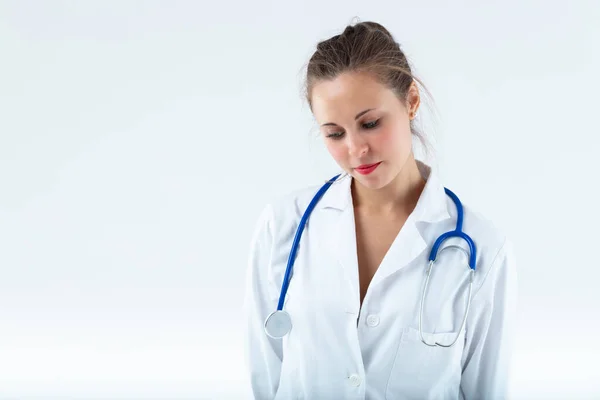 Young Doctor Looks Left Perhaps Sad Perhaps Thoughtful — Stock Photo, Image
