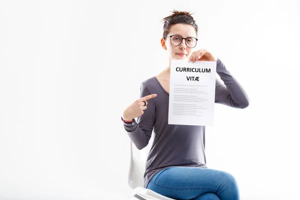 Young Woman Sat Showing Well Done Resume Aka Corruculum Vitae — Stock Photo, Image