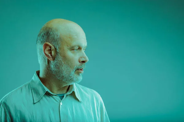 Thoughtful Balding Senior Man Beard Looking Aside Blank Copyspace Blue — Stock Photo, Image