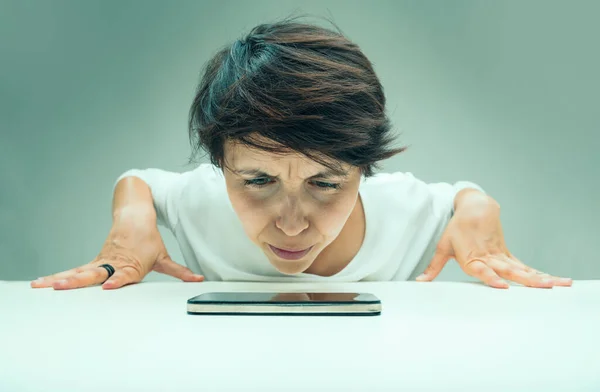 Woman Looks Suspiciously Her Cell Phone Close Doesn Trust Technology — 스톡 사진
