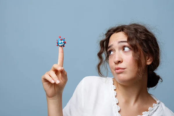 Young Woman Holds Puppet Covid Virus Her Finger Any Fear — Stock Photo, Image