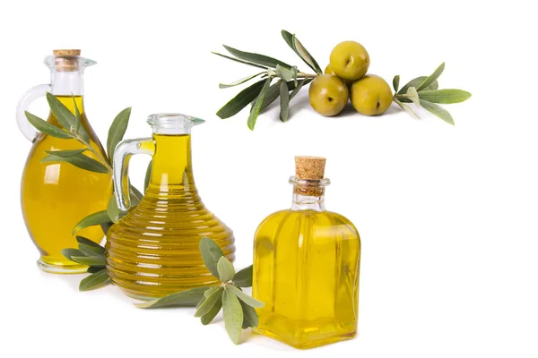 Composition of oil bottles and olives — Stock Photo, Image