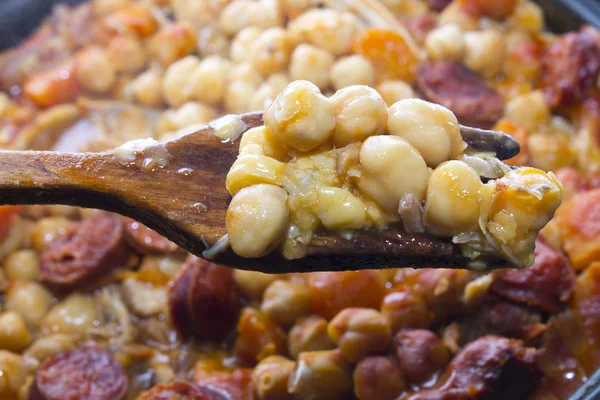 Chickpeas with tomatoes — Stock Photo, Image