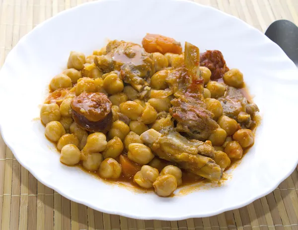 Chickpeas with meat and tomato — Stock Photo, Image