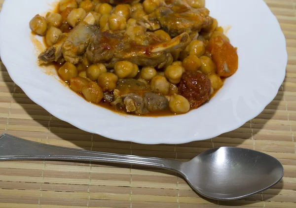 Chickpeas with meat and tomato — Stock Photo, Image