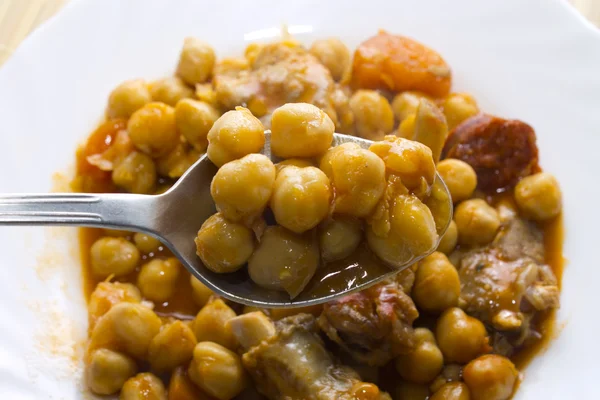 Chickpeas with meat and tomato — Stock Photo, Image