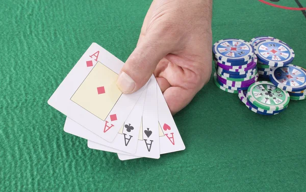 Hand with playing cards — Stock Photo, Image