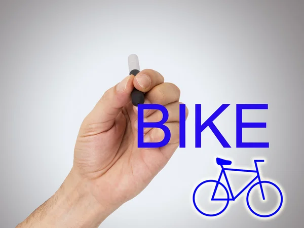 Hand met fiets — Stockfoto