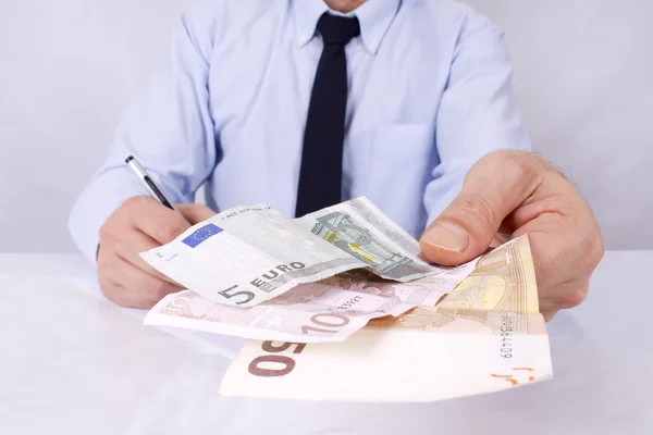 Hombre de negocios con dinero — Foto de Stock