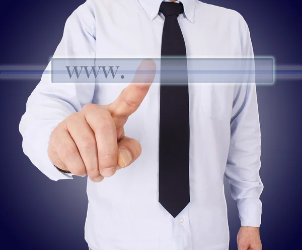 Businessman pointing to a button — Stock Photo, Image