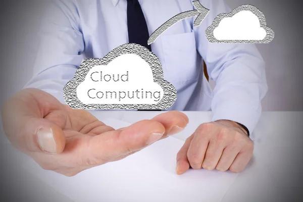 Businessman in the office with cloud — Stock Photo, Image