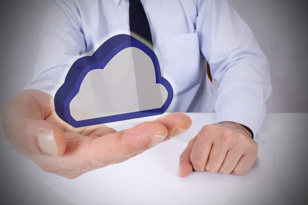 Businessman in the office with cloud — Stock Photo, Image