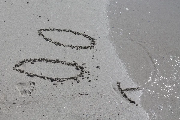 Lettering na praia — Fotografia de Stock