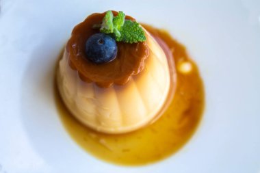 delicious flan with caramel on the plate