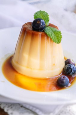 delicious flan with caramel on the plate