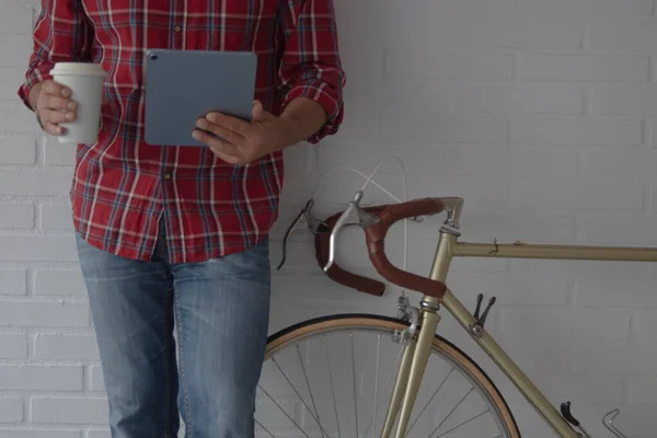 Hipster Man Digital Tablet Coffee Next Bike — Stock Photo, Image