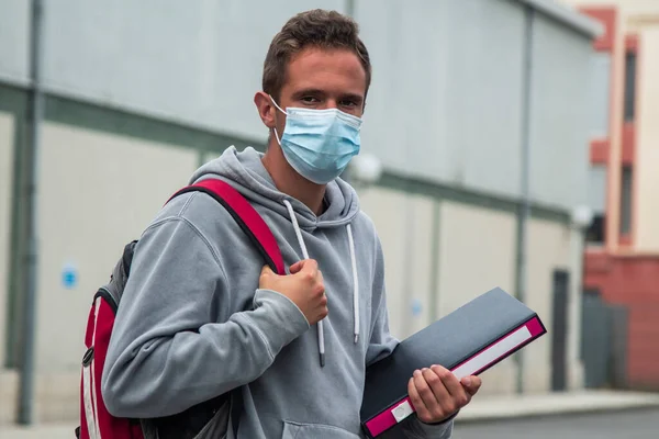 student with medical mask in the institute or university in the new normal