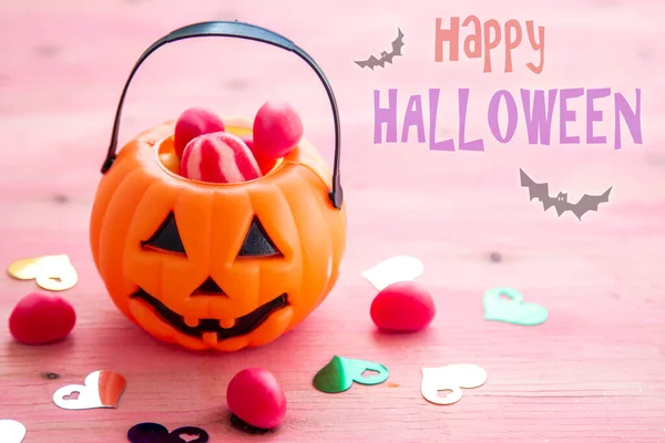 Pumpkin Bucket Full Candies Isolated Pink Happy Halloween — Stockfoto