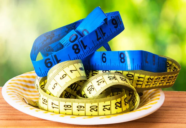 Diet Slimming Concept Plate Colored Tape — Stock Photo, Image