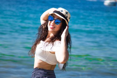 happy woman relaxed on the beach
