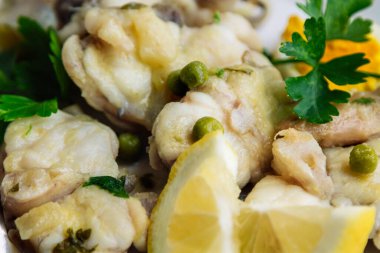 hake or monkfish, fresh fish in green sauce