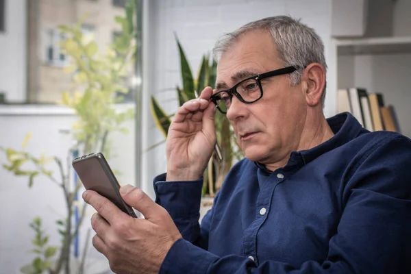 Adult Man Presbyopia Tired Eyes Consulting Phone Home — Foto de Stock