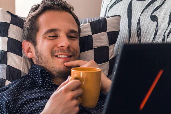 Happy Attractive Man Having Coffee Consulting His Laptop Home — Stock Fotó