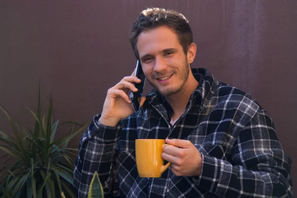 Relaxed Man Talking Phone While Having Cup Coffee — Φωτογραφία Αρχείου