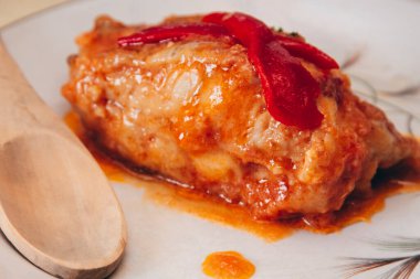 Domates soslu ve biberli balık.