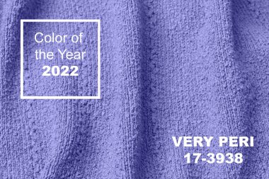2022 'nin moda renginde örülmüş yün süveterin dokusu çok moda. Web tasarımı için modaya uygun yumuşak bir arka plan. Moda ve giyim endüstrisi için 2022 yılının rengini gösteriyor.