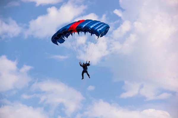 stock image paragliding in the blue sky